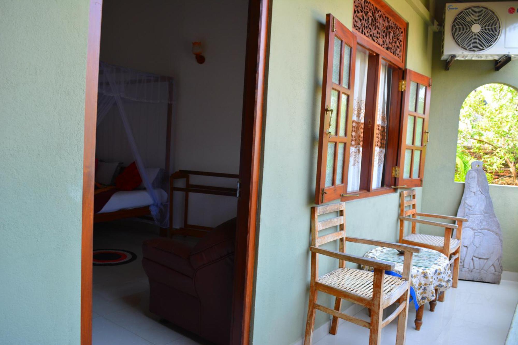 Frangipani Motel Galle Quarto foto